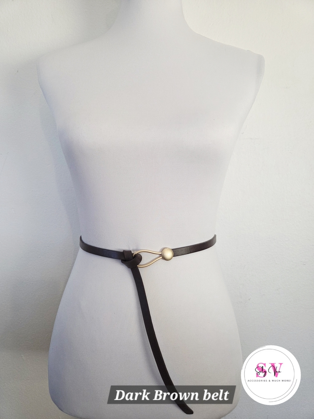 Thin dark brown belt with gold buckle